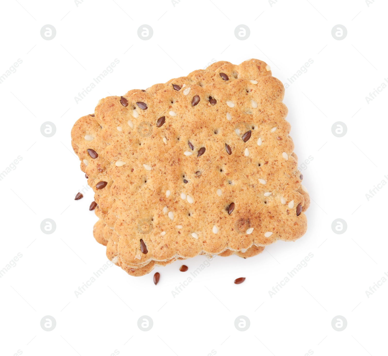 Photo of Stack of cereal crackers with flax and sesame seeds isolated on white, top view