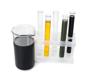 Beaker and test tubes with different types of oil isolated on white