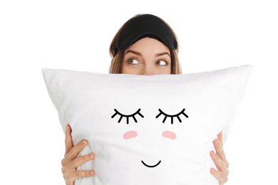 Image of Woman holding pillow with cute face on white background