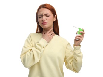 Photo of Young woman holding throat spray on white background