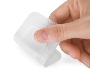 Photo of Woman with medical adhesive bandage isolated on white, closeup