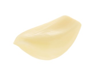 Photo of One peeled clove of garlic isolated on white