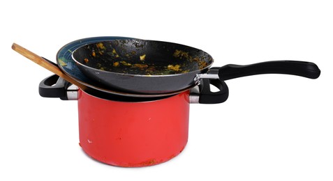 Stack of dirty kitchenware on white background