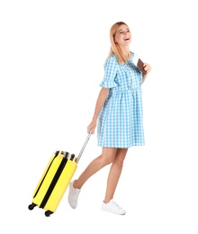 Woman with suitcase and passport on white background. Vacation travel