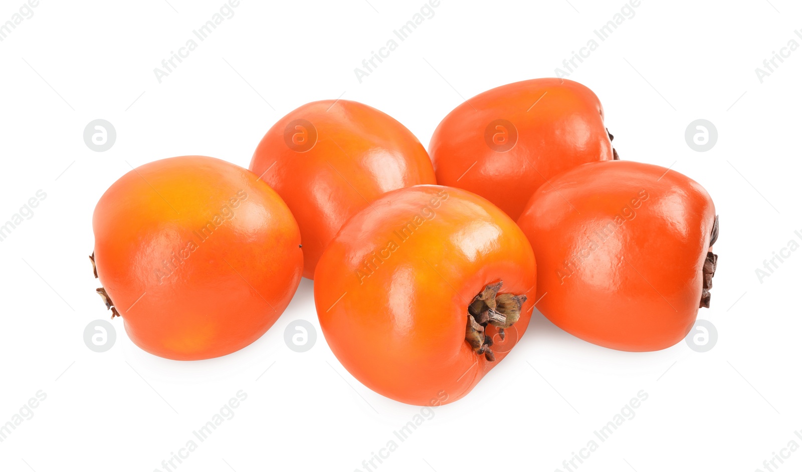 Photo of Delicious ripe juicy persimmons isolated on white