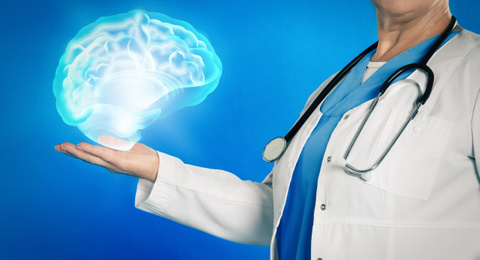 Mature doctor holding digital image of brain in palm on blue background, closeup