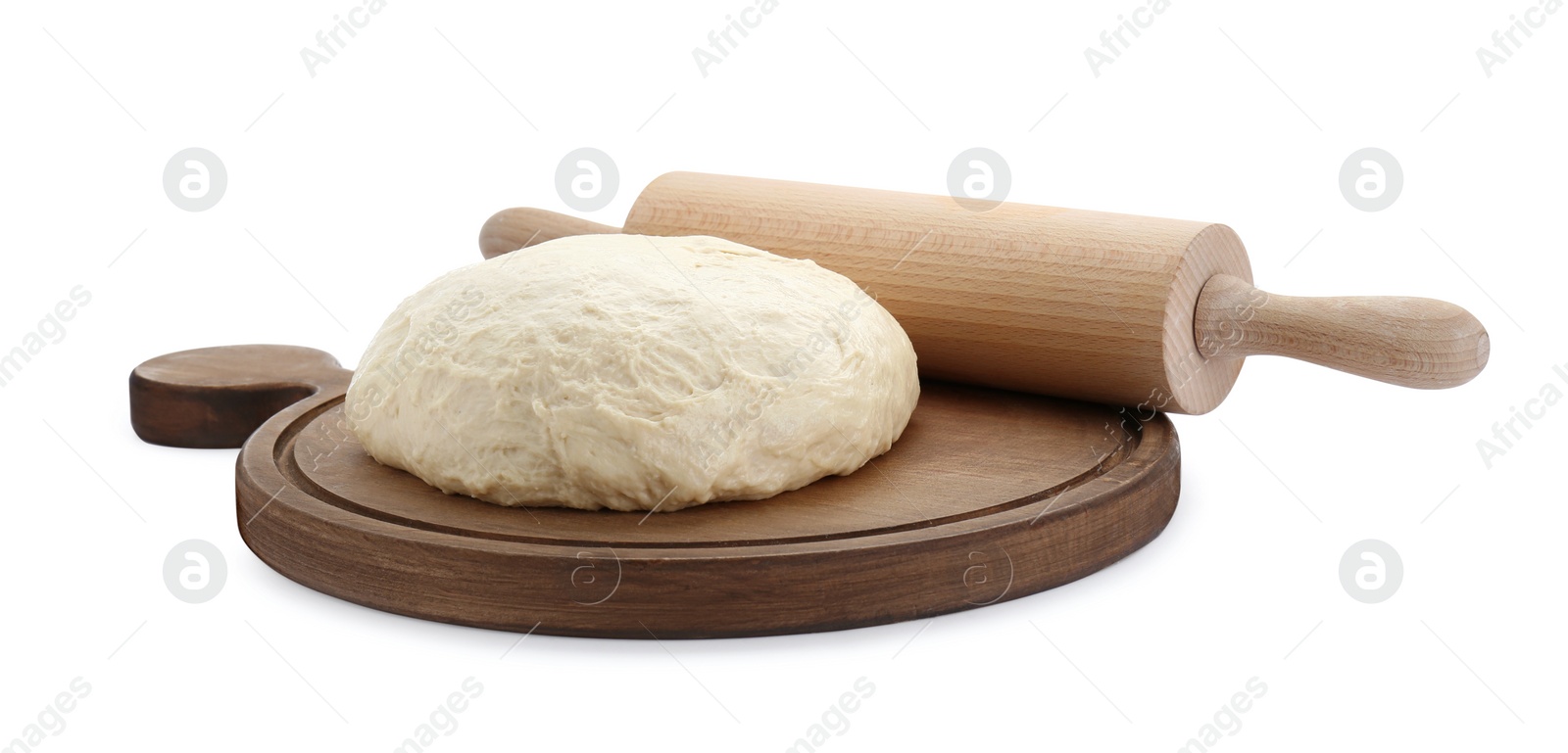 Photo of Fresh yeast dough and wooden rolling pin isolated on white