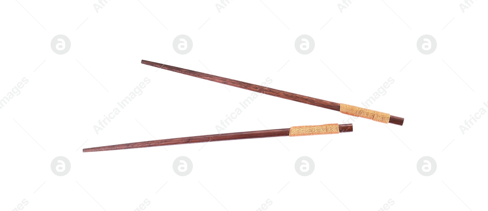 Photo of Pair of wooden chopsticks isolated on white, top view