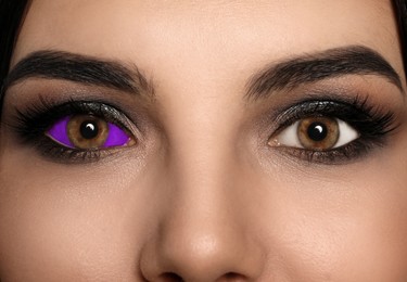 Closeup view of woman with eyeball tattoo
