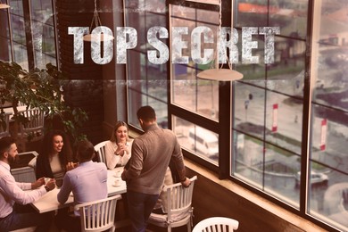 Image of Classified information. Stamp Top Secret on photo of people in restaurant