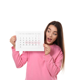Photo of Young woman holding calendar with marked menstrual cycle days isolated on white