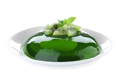 Delicious green jelly with kiwi slices on white background