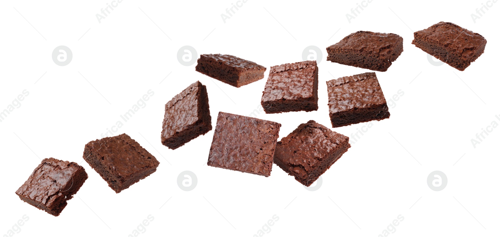 Image of Slices of delicious chocolate brownie flying on white background. Banner design