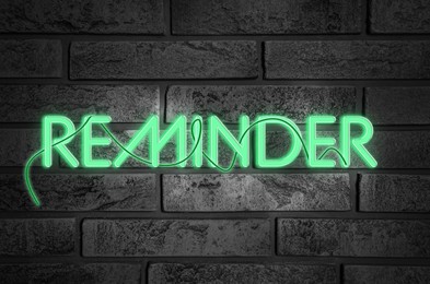 Image of Word REMINDER against brick background. Don't forget 