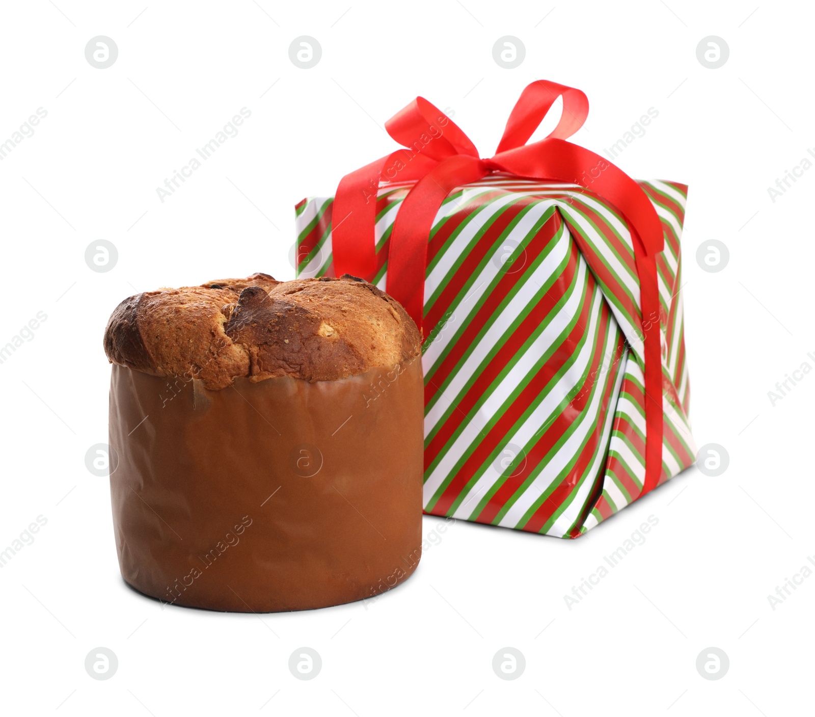 Photo of Delicious Panettone cake and gift box on white background. Traditional Italian pastry