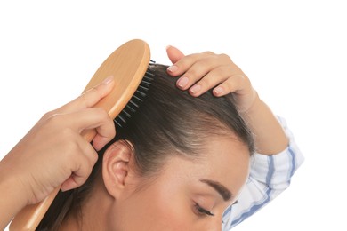 Woman with hair loss problem on white background, closeup. Trichology treatment