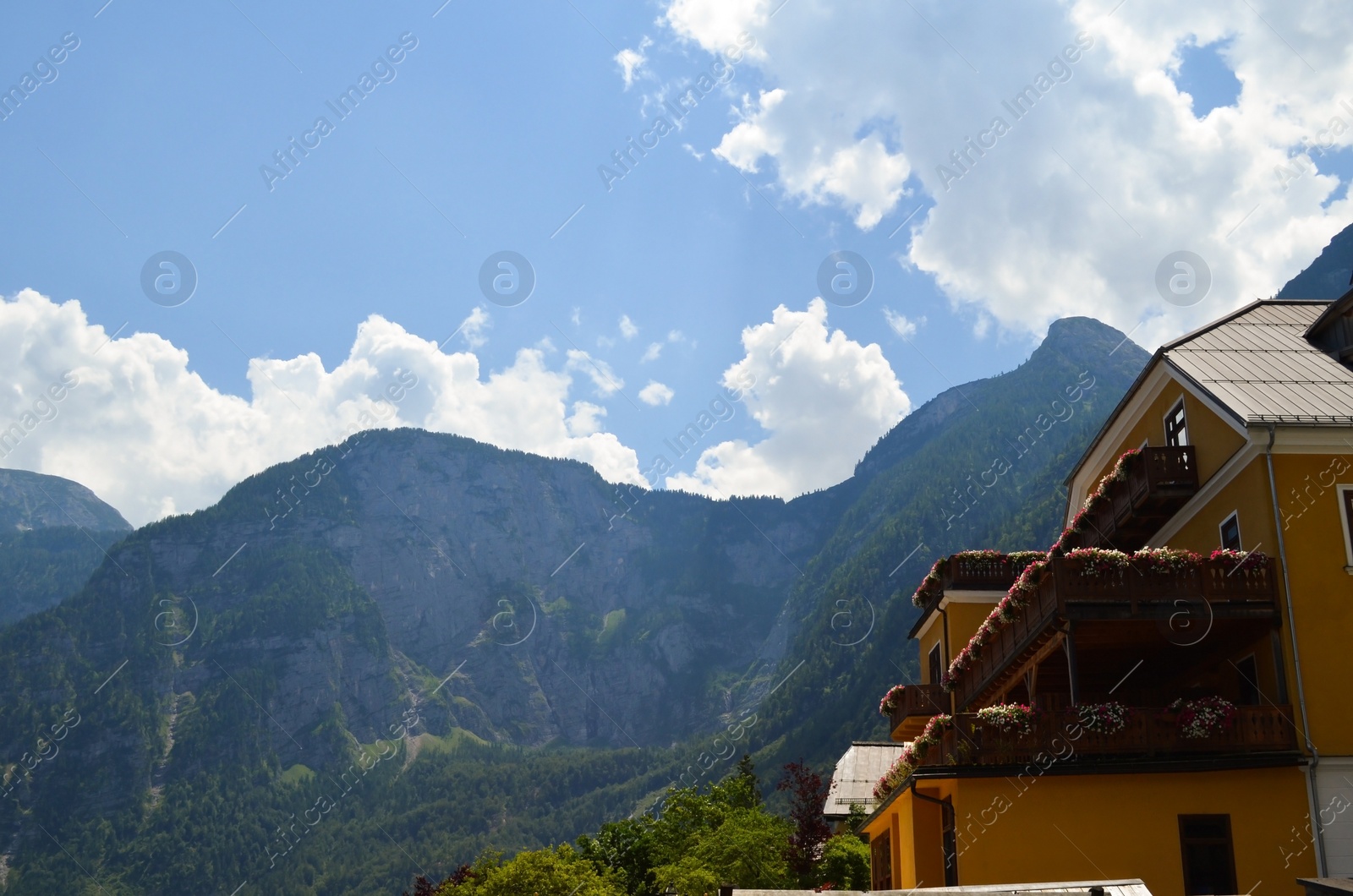 Photo of Picturesque view of beautiful building near mountains