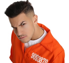 Emotional prisoner in orange jumpsuit on white background