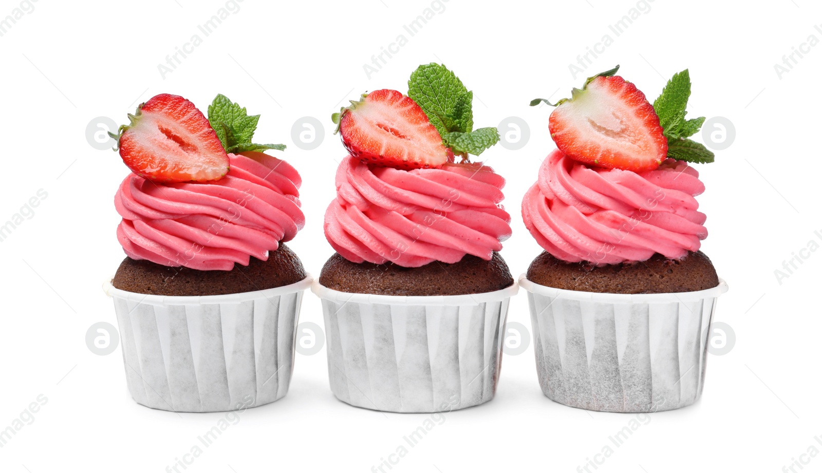 Photo of Sweet cupcakes with fresh strawberries on white background