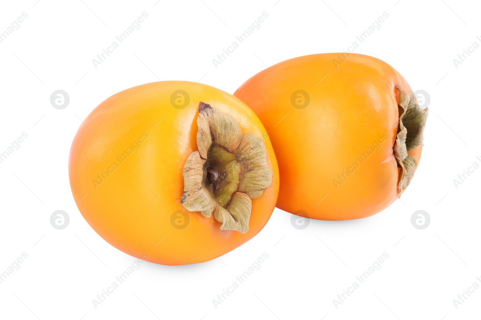 Photo of Delicious ripe juicy persimmons isolated on white