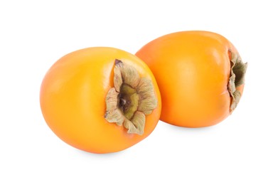 Delicious ripe juicy persimmons isolated on white