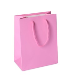 Photo of One pink shopping bag isolated on white