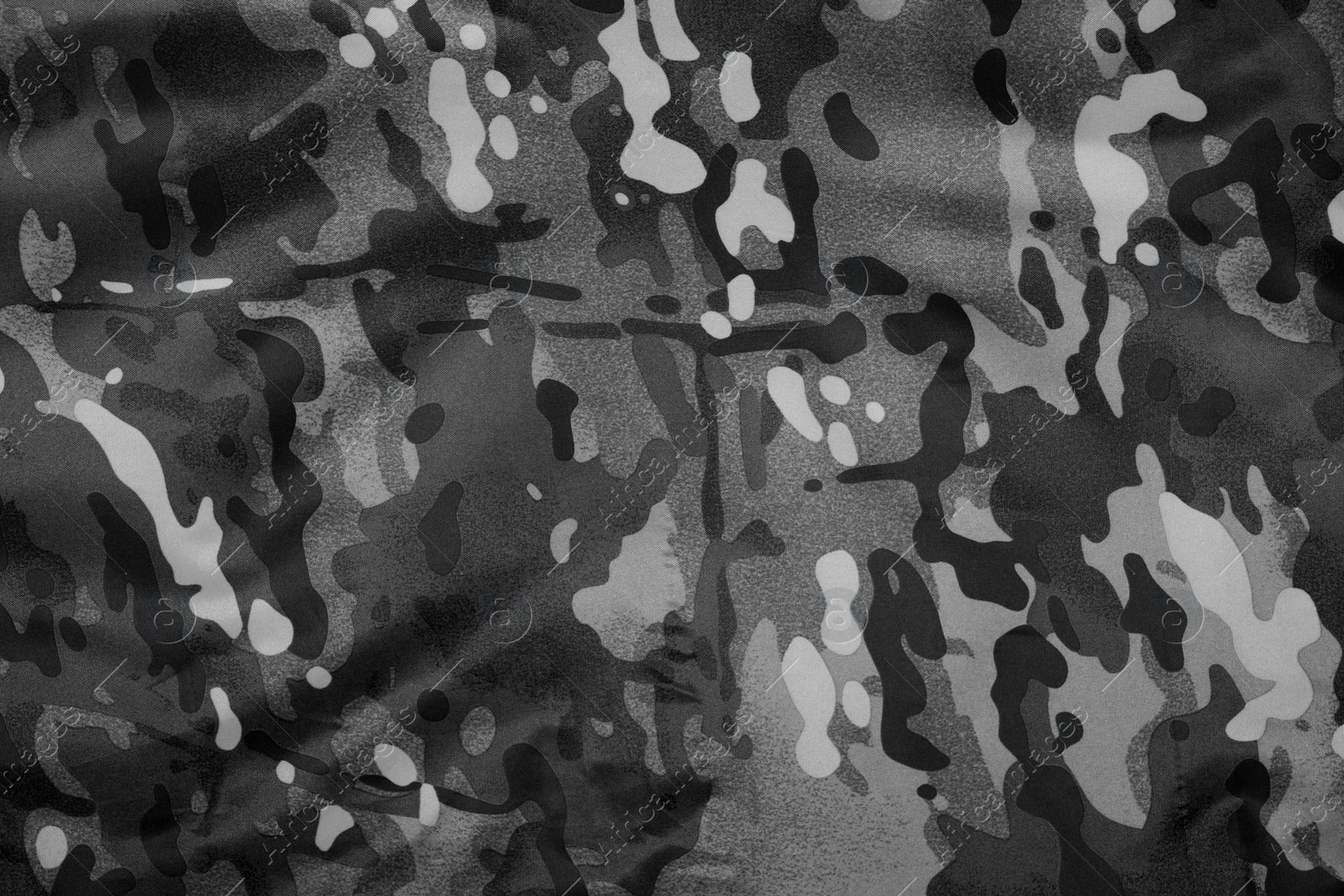 Image of Texture of camouflage fabric as background, top view. Black and white effect