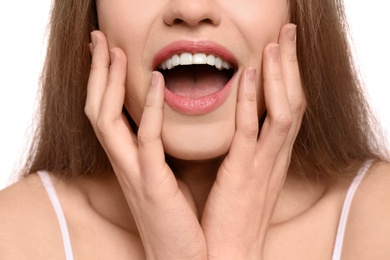 Photo of Young woman with beautiful smile, closeup. Teeth whitening