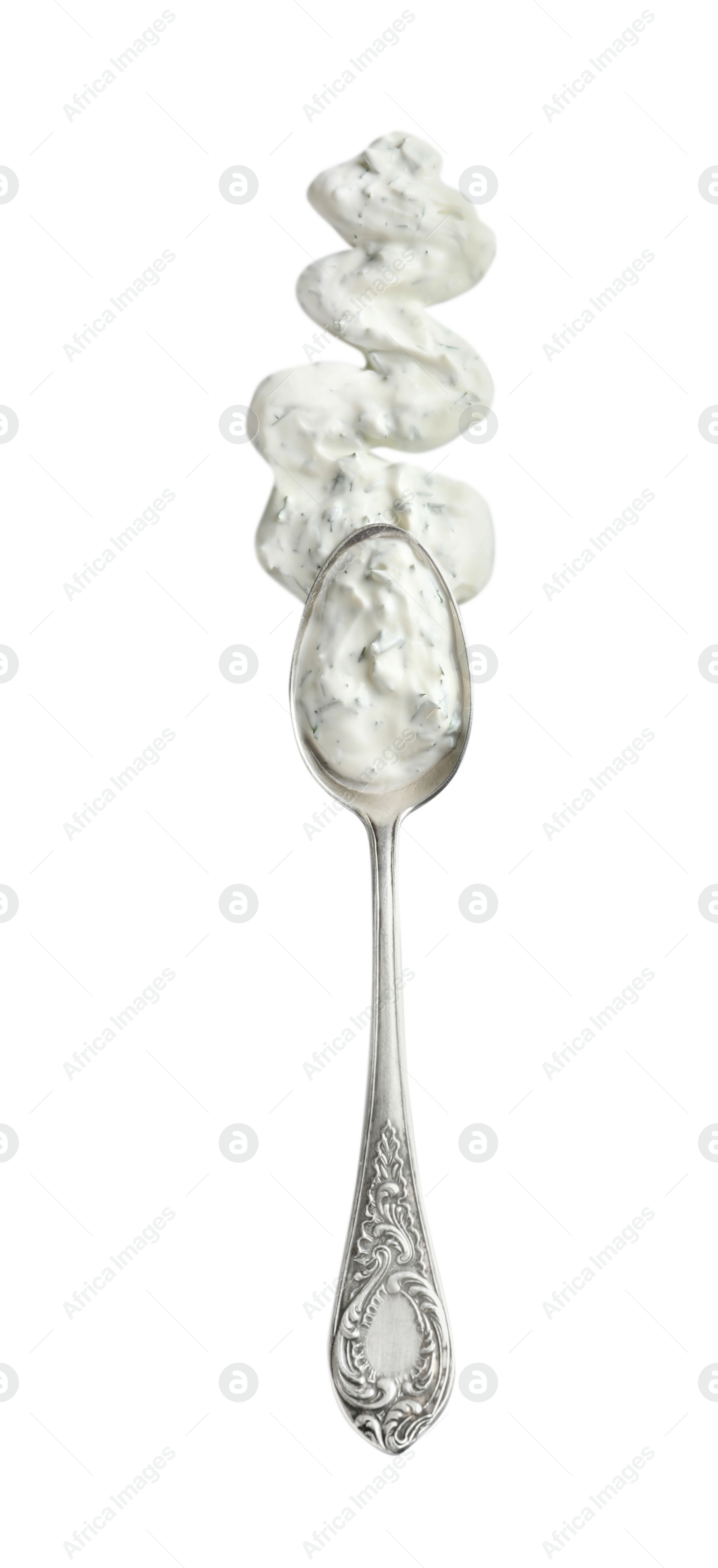 Photo of Delicious tartar sauce and spoon on white background, top view