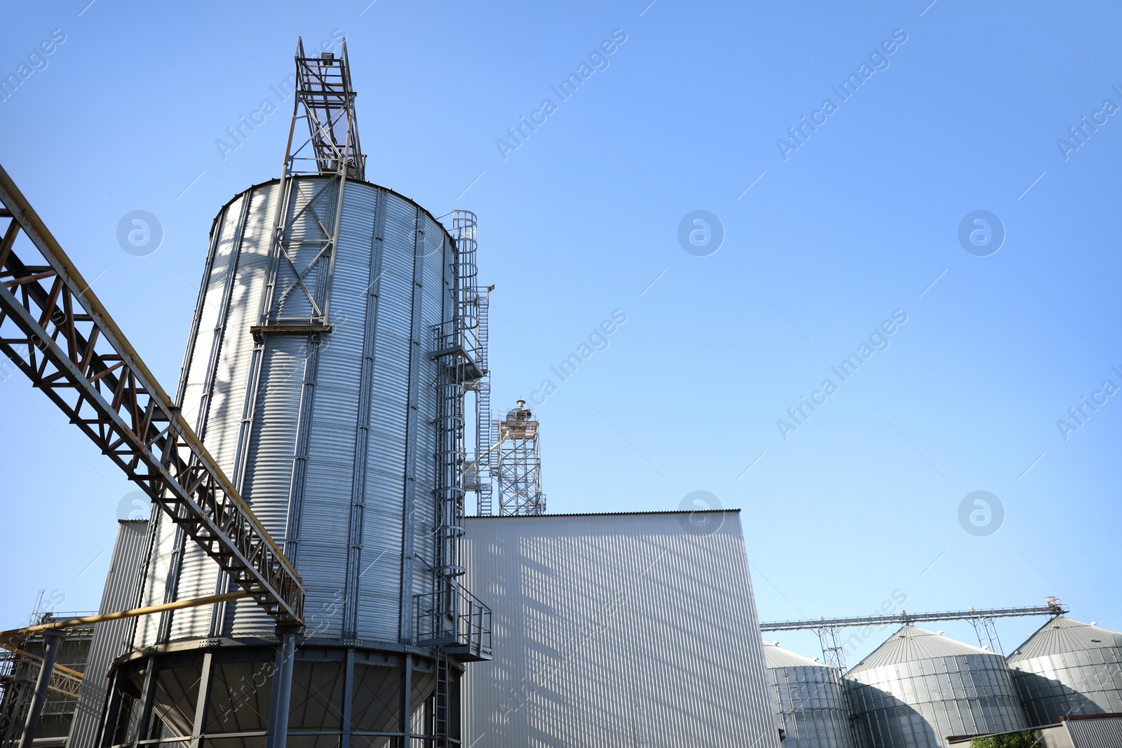 Photo of View of modern granaries for storing cereal grains outdoors