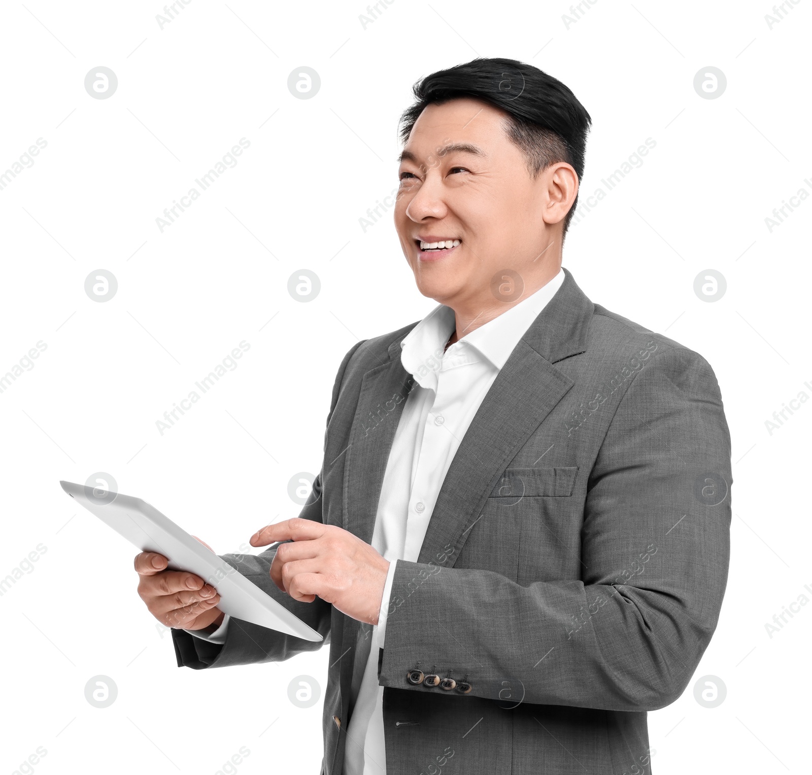 Photo of Businessman in suit with tablet on white background