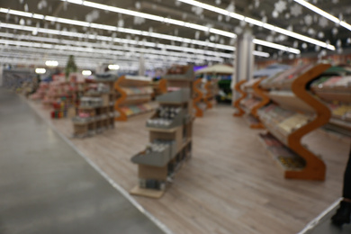 Photo of Blurred view of shopping mall interior. Bokeh effect