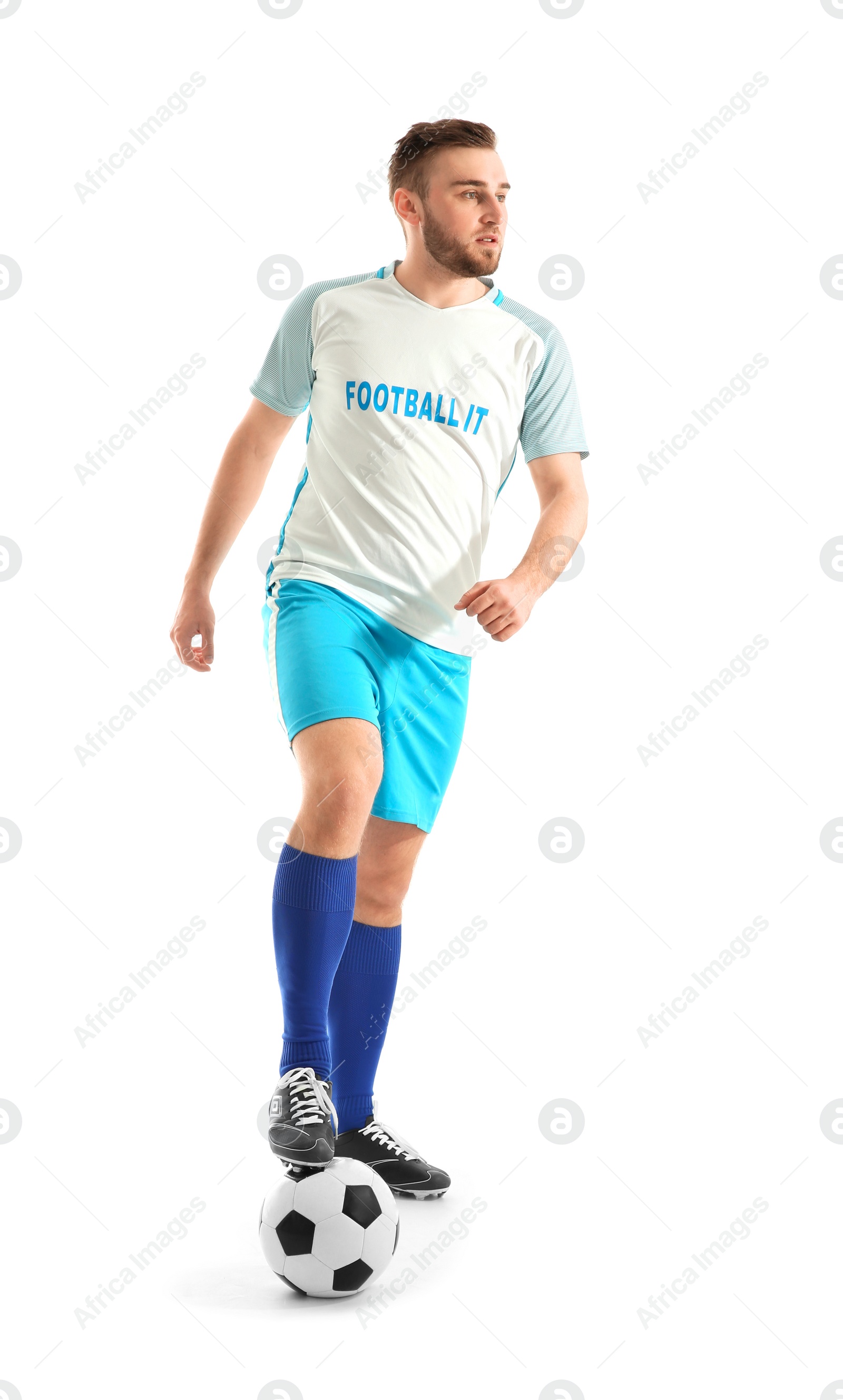 Photo of Young man playing football on white background