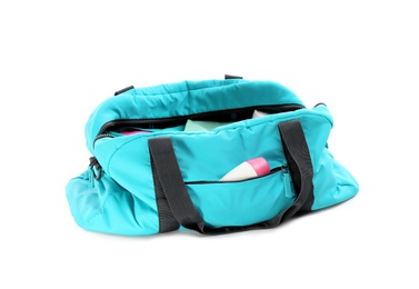 Photo of Sport bag with deodorant on white background