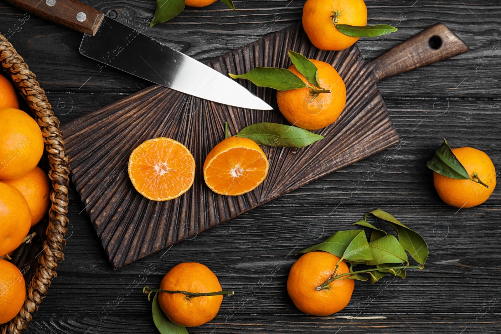 Photo of Flat lay composition with fresh ripe tangerines on wooden background