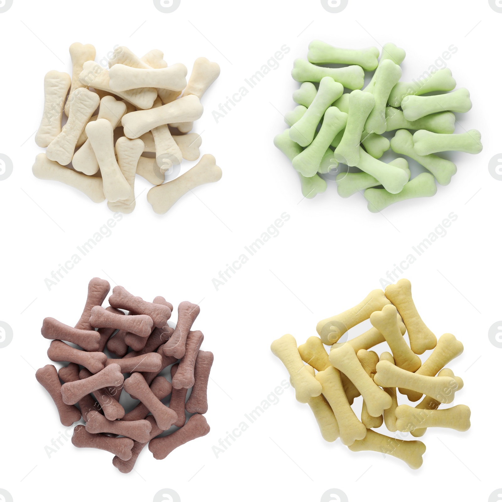 Image of Set with piles of different bone shaped dog cookies on white background, top view