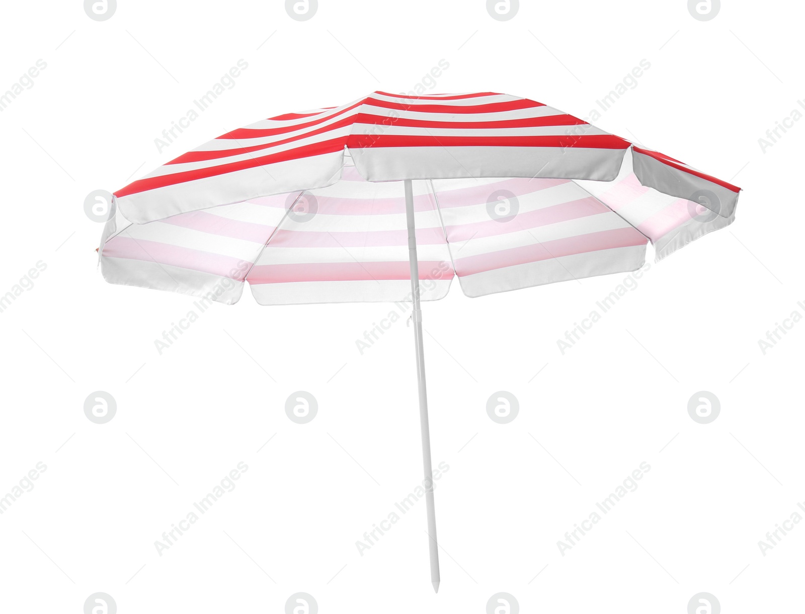 Photo of Open red striped beach umbrella isolated on white