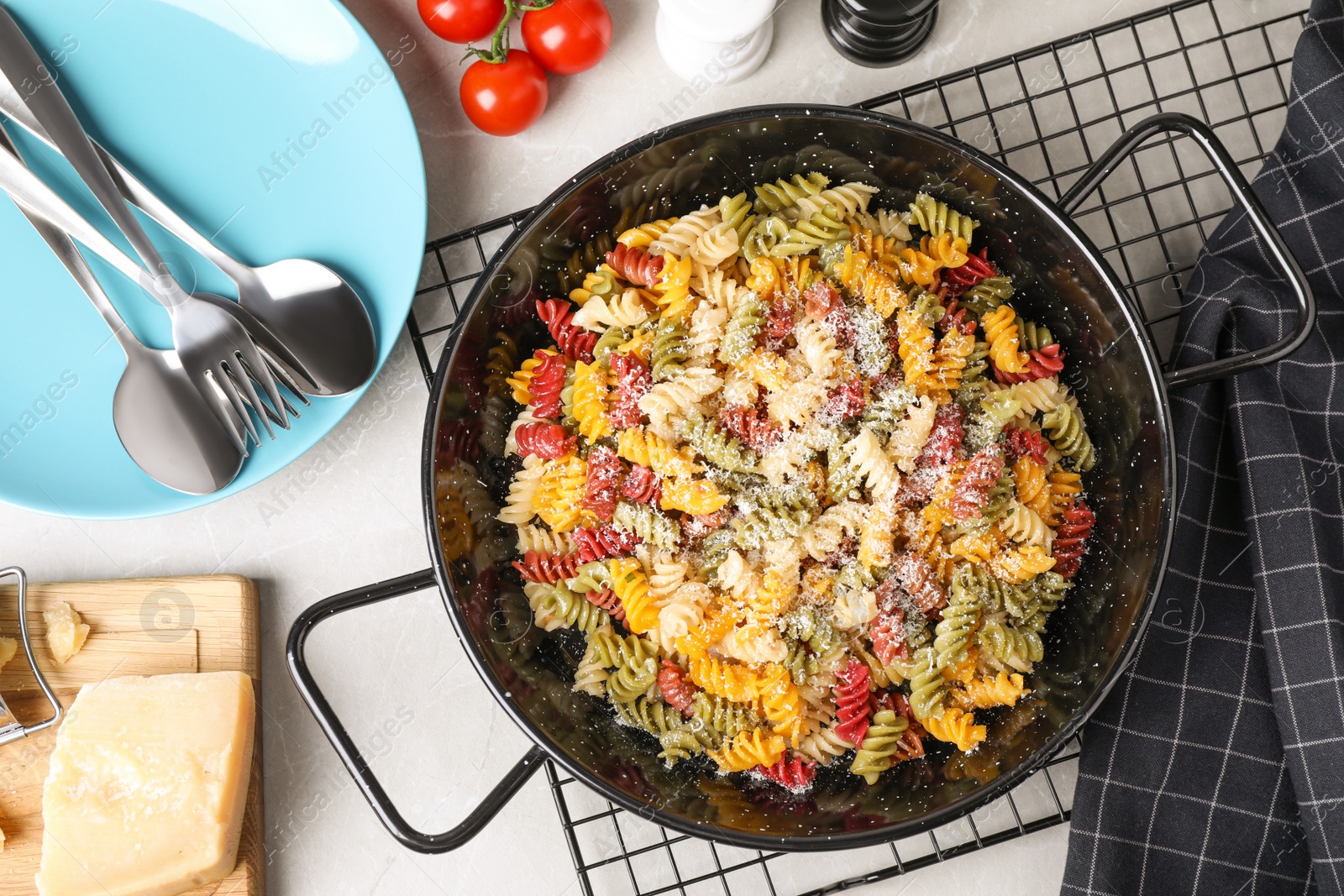 Photo of Flat lay composition with tasty pasta on light grey marble table