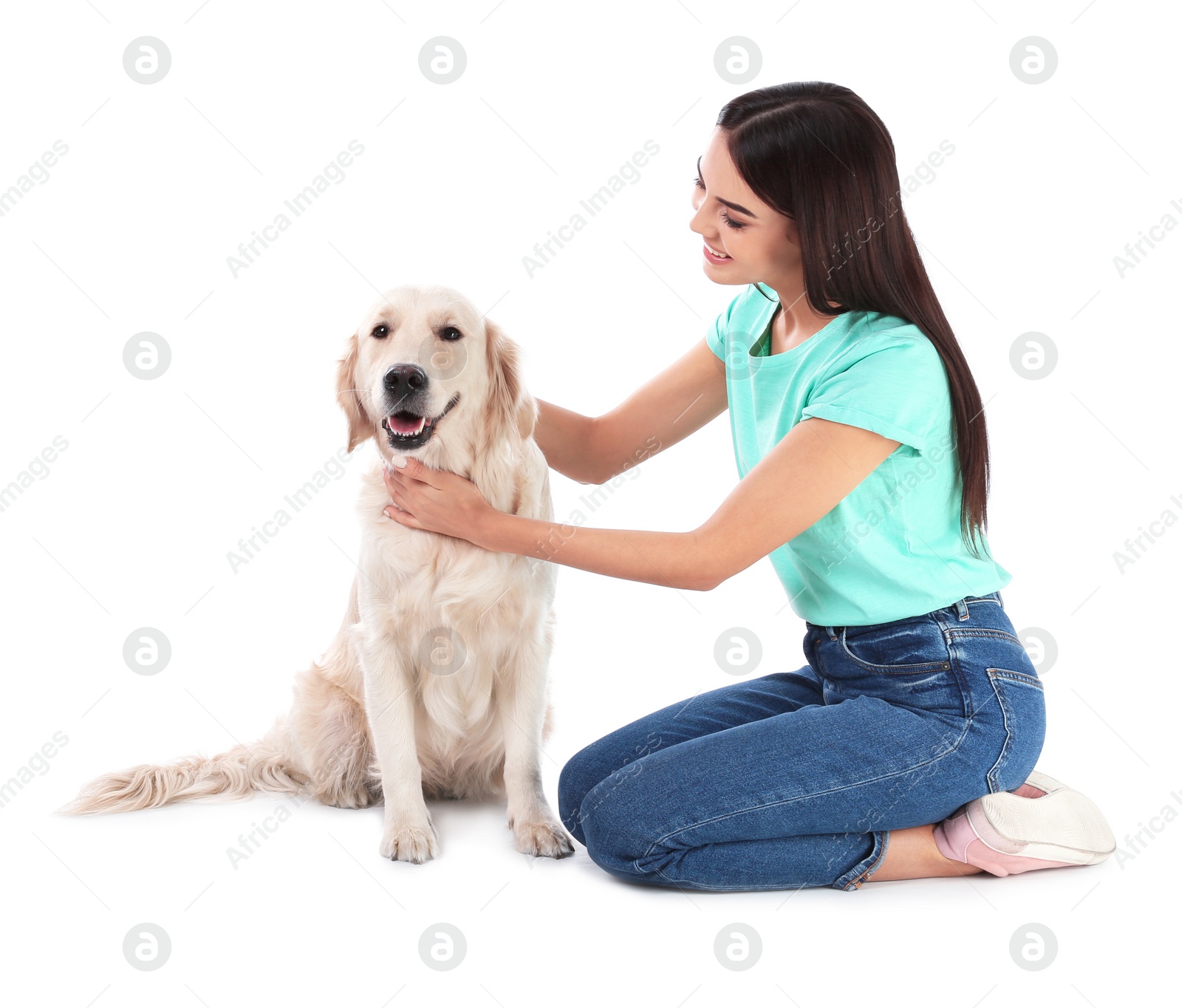 Photo of Young woman and her Golden Retriever dog on white background