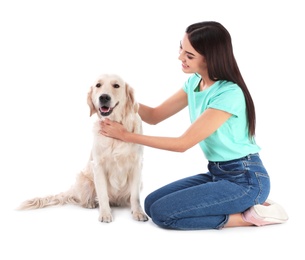 Photo of Young woman and her Golden Retriever dog on white background