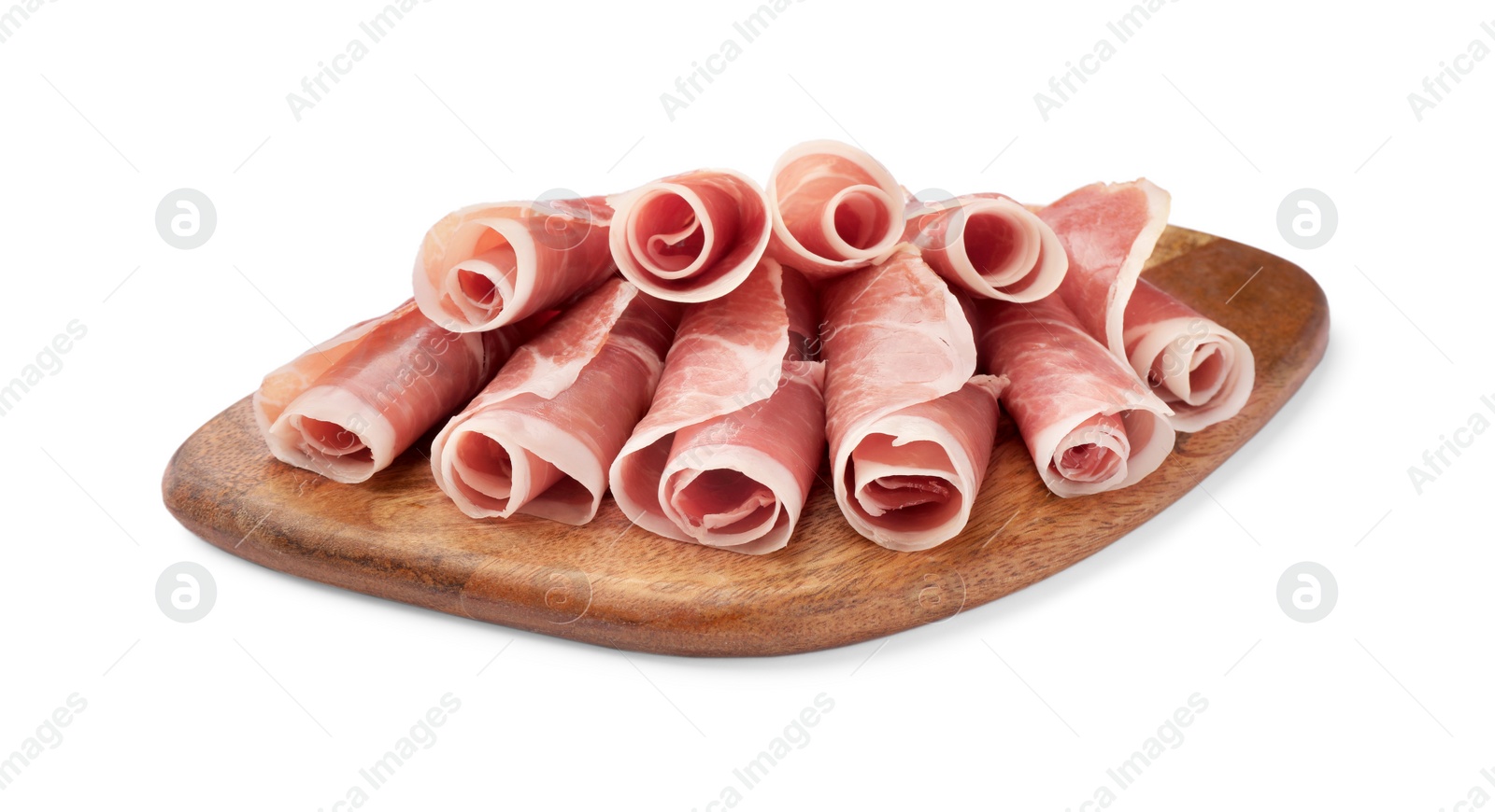 Photo of Wooden board with rolled slices of delicious jamon isolated on white