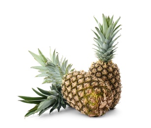 Photo of Fresh pineapples on white background