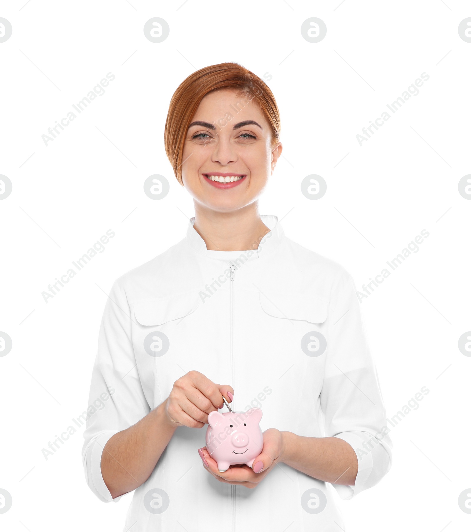 Photo of Portrait of female doctor with piggy bank on white background