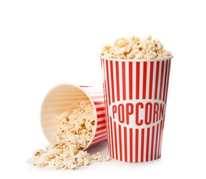 Photo of Paper cups with of tasty popcorn on white background