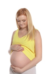 Photo of Beautiful pregnant woman showing her tummy on white background