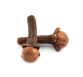 Photo of Aromatic organic dry cloves on white background