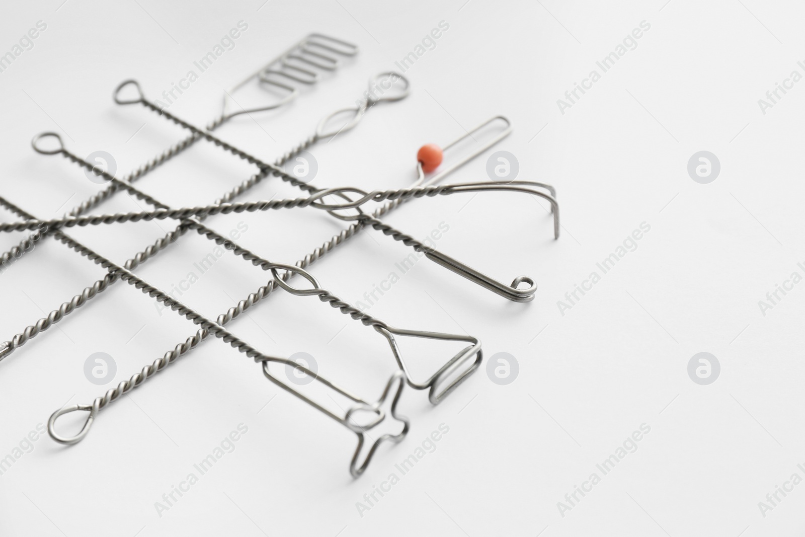 Photo of Set of logopedic probes on white background. Speech therapist's tools