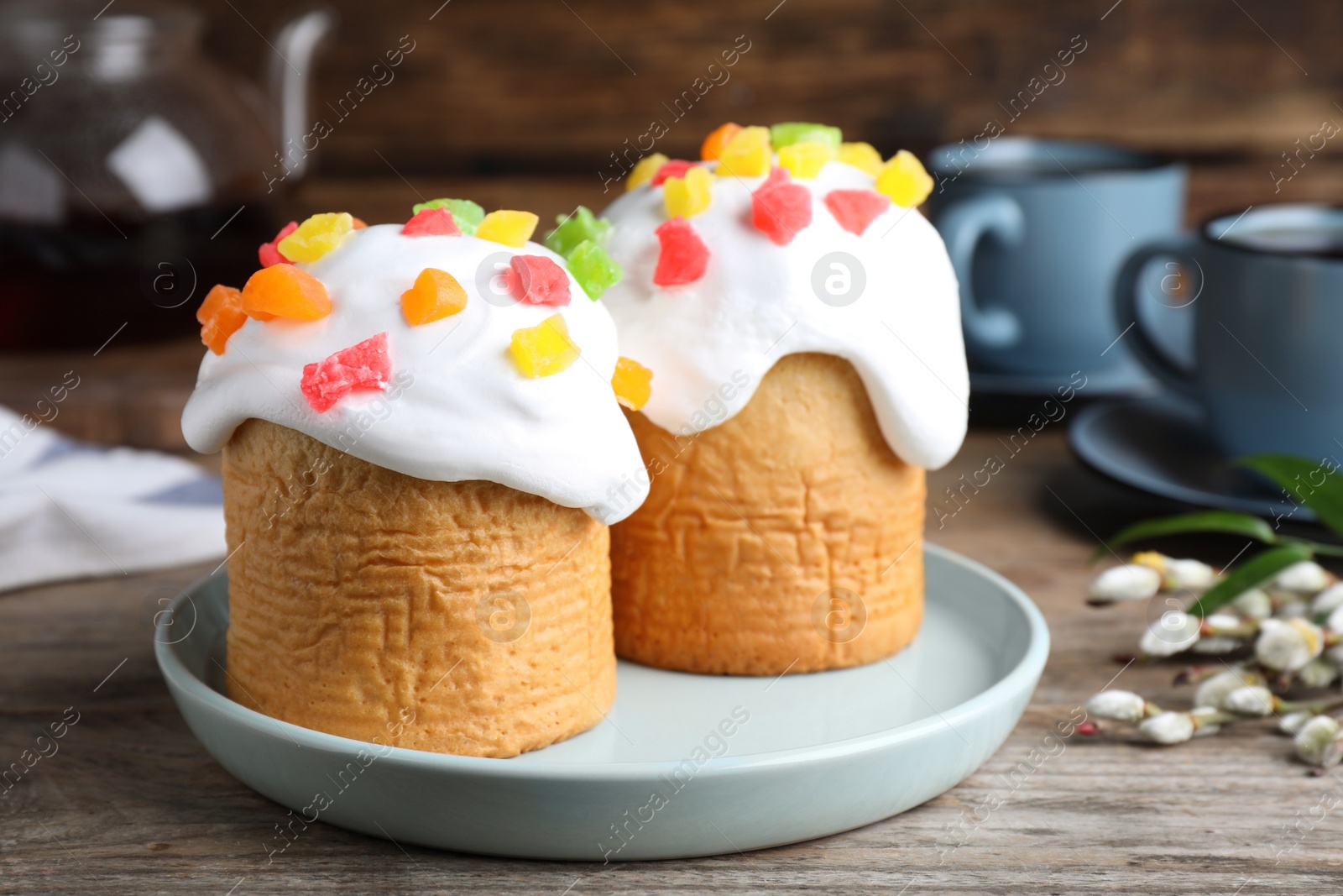 Photo of Beautiful decorated Easter cakes on wooden table