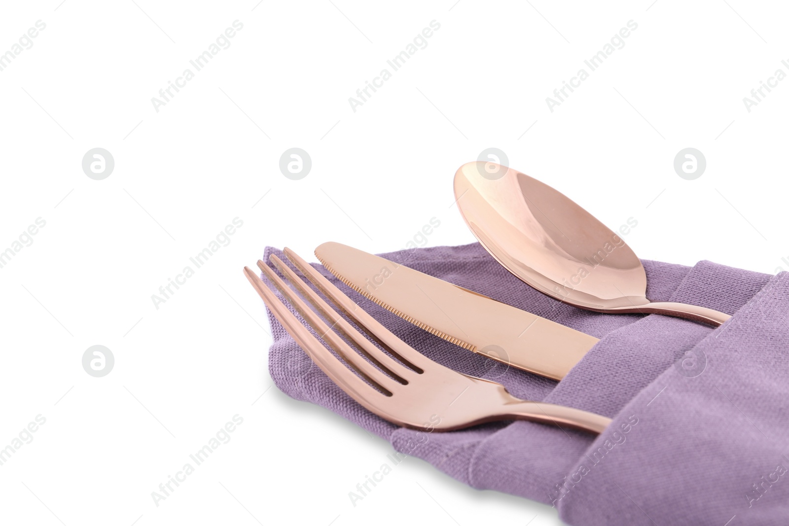 Photo of Stylish shiny cutlery set isolated on white