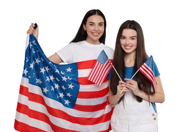 Image of 4th of July - Independence day of America. Happy mother and daughter with national flags of United States on white background